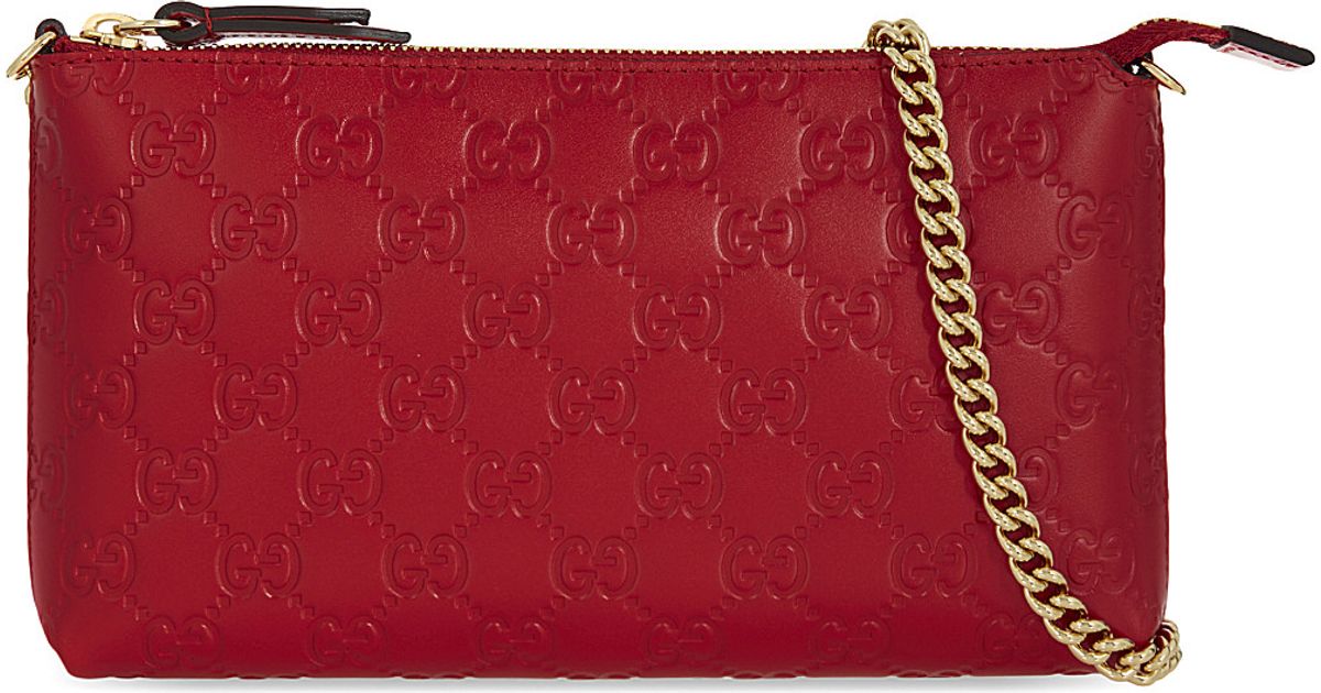 gucci embossed clutch